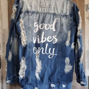 Distressed denim jacket